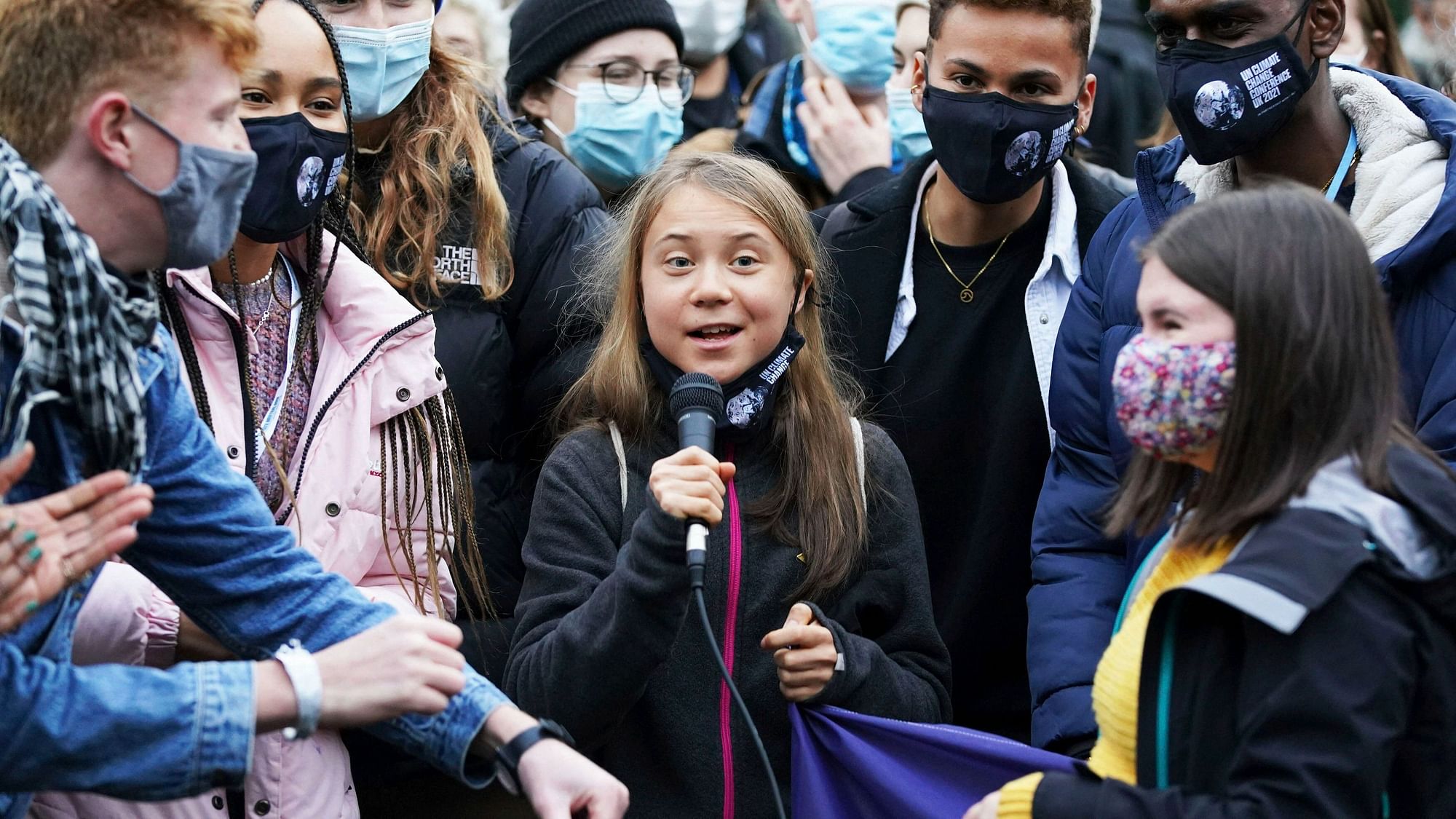 <div class="paragraphs"><p>Swedish climate activist Greta Thunberg, centre, speaks alongside fellow climate activists during a demonstration at Festival Park, in Glasgow, on the first day of the COP26 summit, in Glasgow, Scotland, Tuesday, 2 November.<br></p></div>