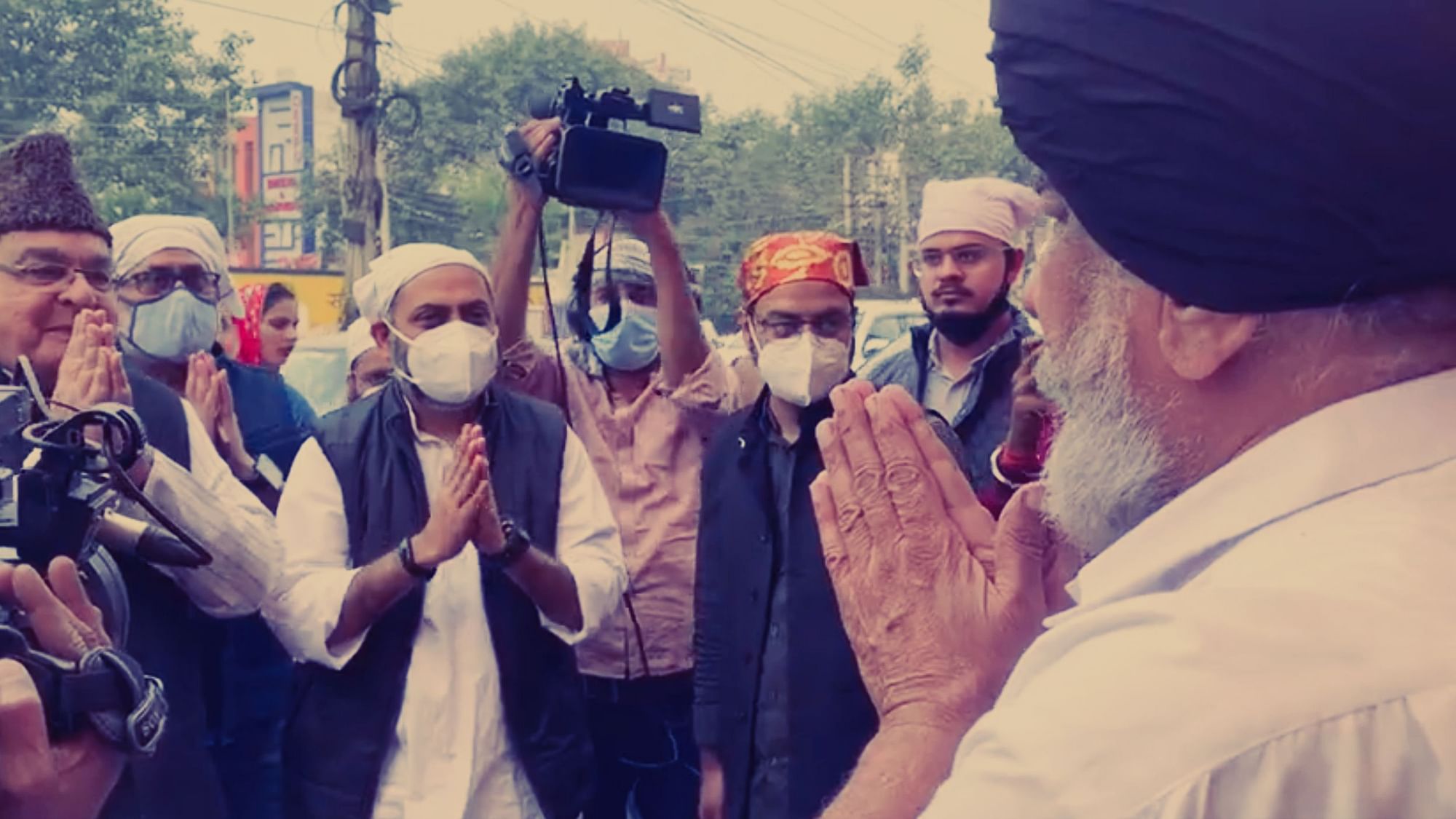 <div class="paragraphs"><p>Members of the Gurgaon Nagrik Ekta Manch, Mohd Adeeb and Altaf Ahmad, along with others were welcomed by Daya Singh, member of the Gurudwara Committee, as they arrived to wish Sikhs on Gurpurab.</p></div>