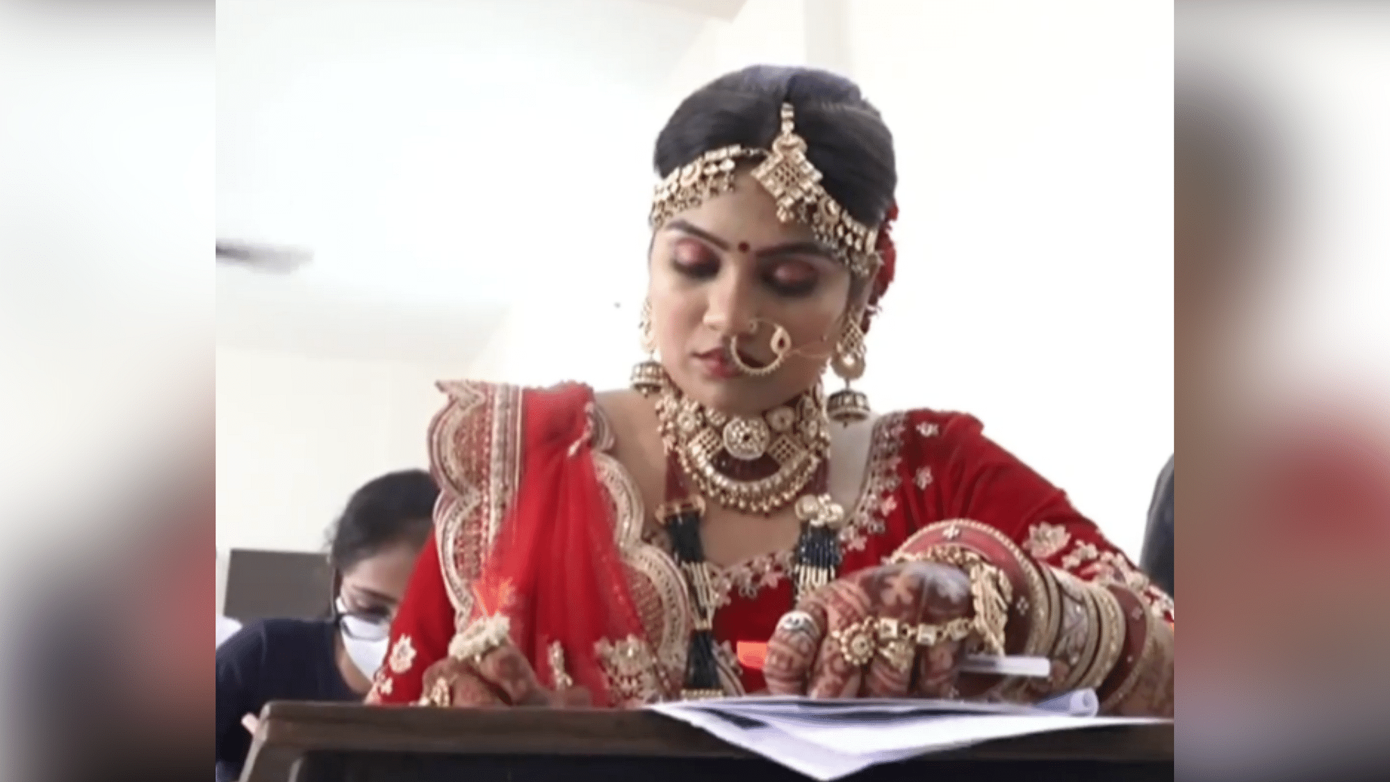 <div class="paragraphs"><p>Bride appears for exam before getting married.</p></div>