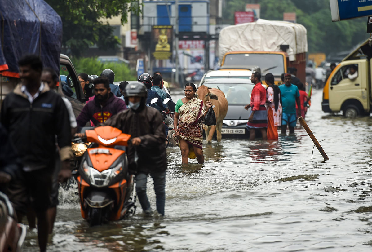 Visuals from Tamil Nadu show people wading through knee-deep water, and even using boats for transit.