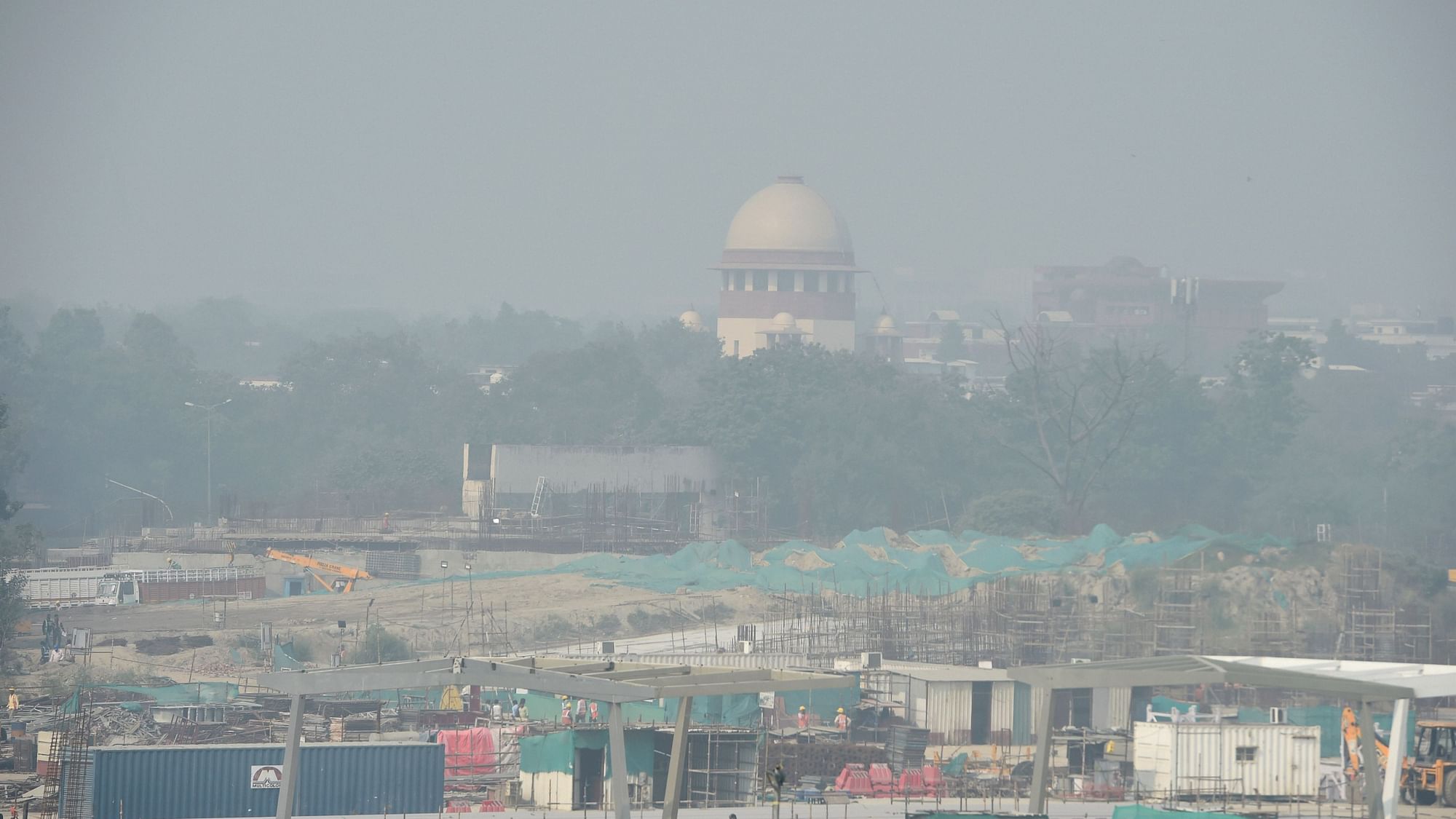 <div class="paragraphs"><p>A view of the Supreme Court of India, shrouded in smog, in New Delhi, Saturday, 13 November. </p></div>