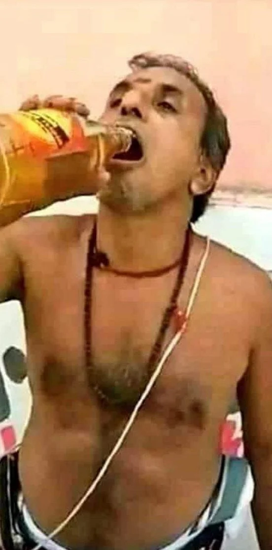 <div class="paragraphs"><p>Viral image showing man drinking liquor. </p></div>