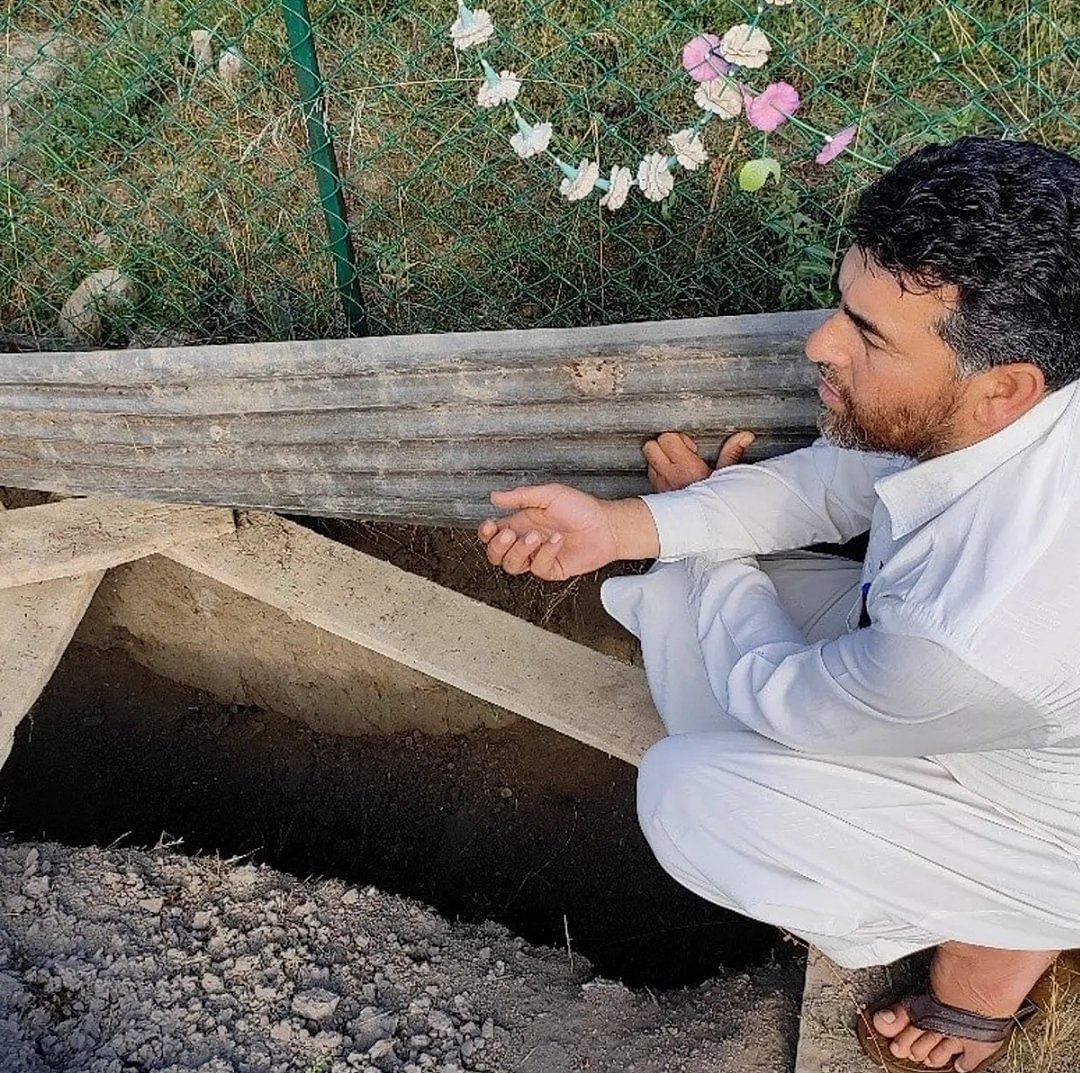 <div class="paragraphs"><p>Athar Mushtaq's father dug a grave for his son, which lies empty today.&nbsp;</p></div>