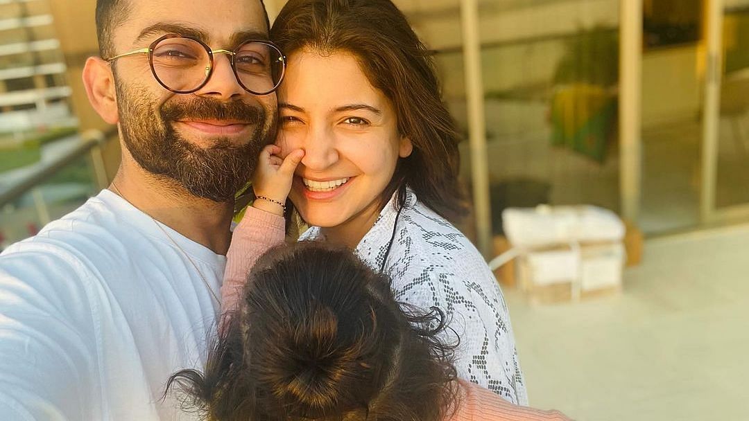 <div class="paragraphs"><p>Anushka Sharma and Virat Kohli with their daughter Vamika.</p></div>