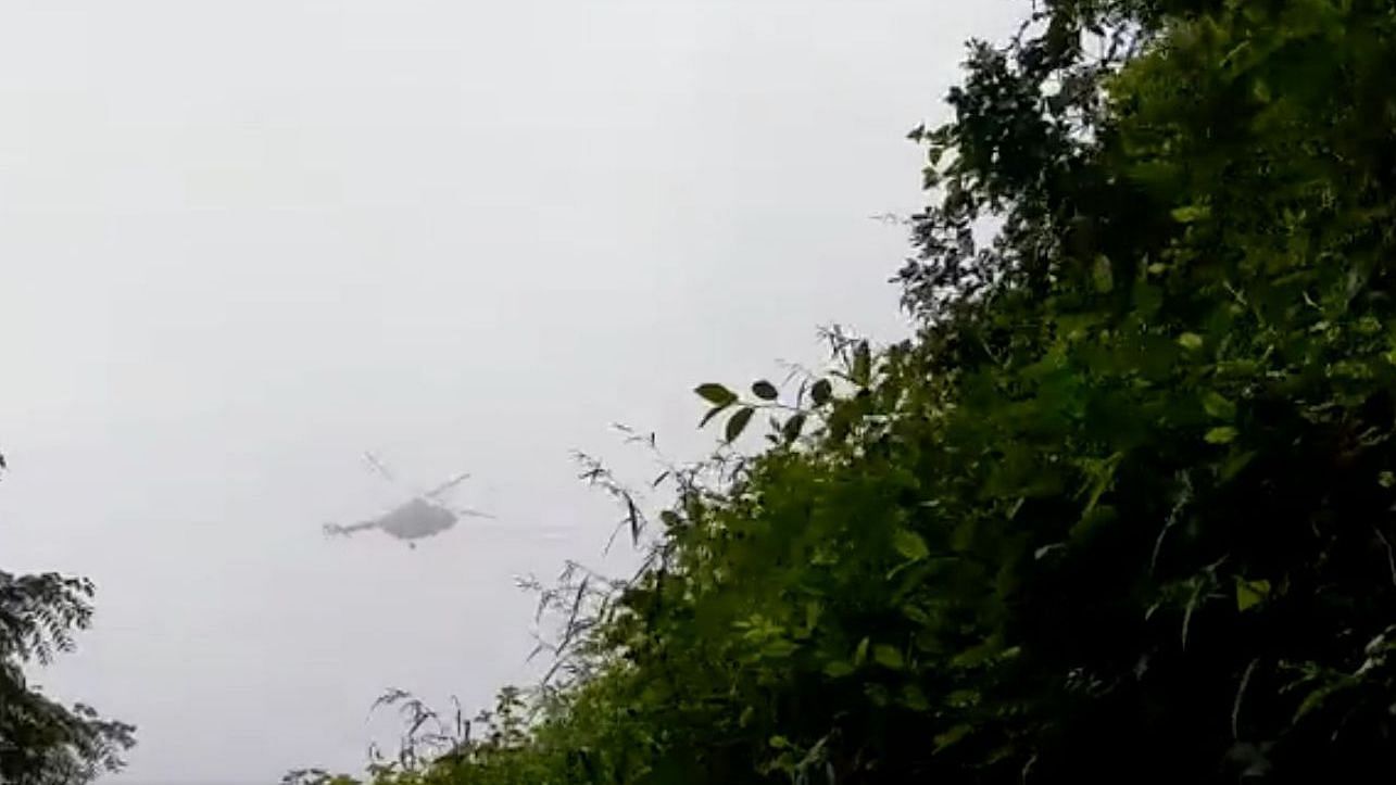 <div class="paragraphs"><p>In the video, the noisy chopper carrying military officials can be spotted flying over a cloud cover before it disappears behind the trees.</p></div>