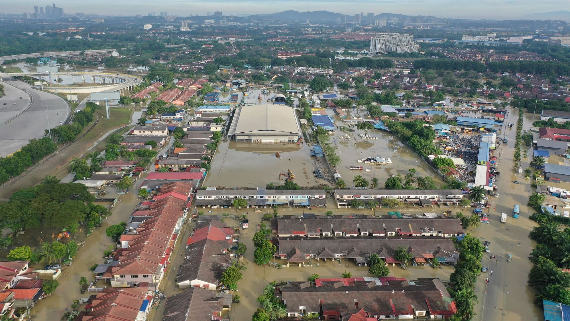 <div class="paragraphs"><p>Shah Alam: This aerial photo provided by Lion Club International 308B1, shows a flooded village in Shah Alam, on the outskirts of Kuala Lumpur, Malaysia, Monday, 20 December.</p></div>