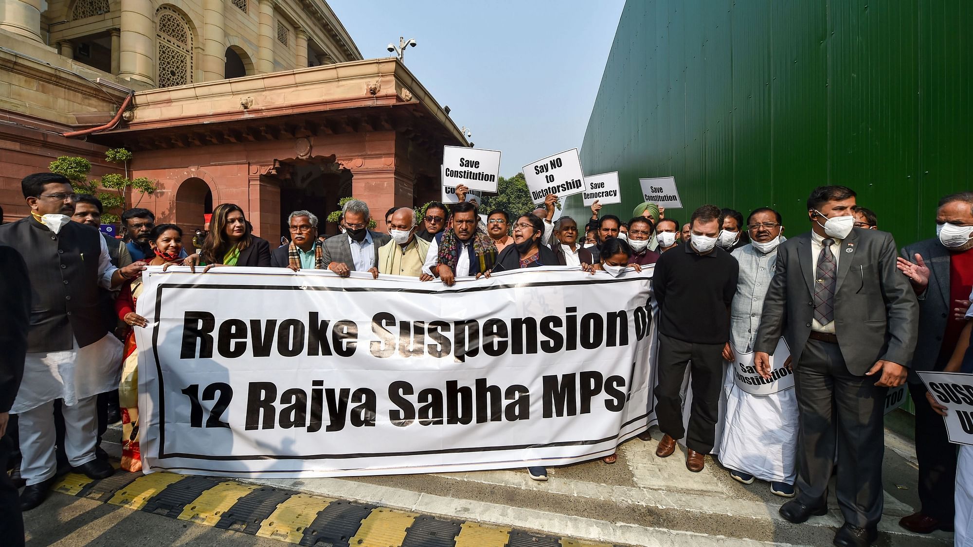 <div class="paragraphs"><p>Parliament members belonging to various Opposition parties on Tuesday, 14 December, marched from the Gandhi statue in the Parliament premises to Vijay Chowk, in order to mark their <a href="https://www.thequint.com/news/india/undemocratic-or-unruly-the-suspension-of-12-mps-stalemate-in-the-parliament">protest against the suspension of 12 MPs</a> from the proceedings of the Rajya Sabha.</p></div>