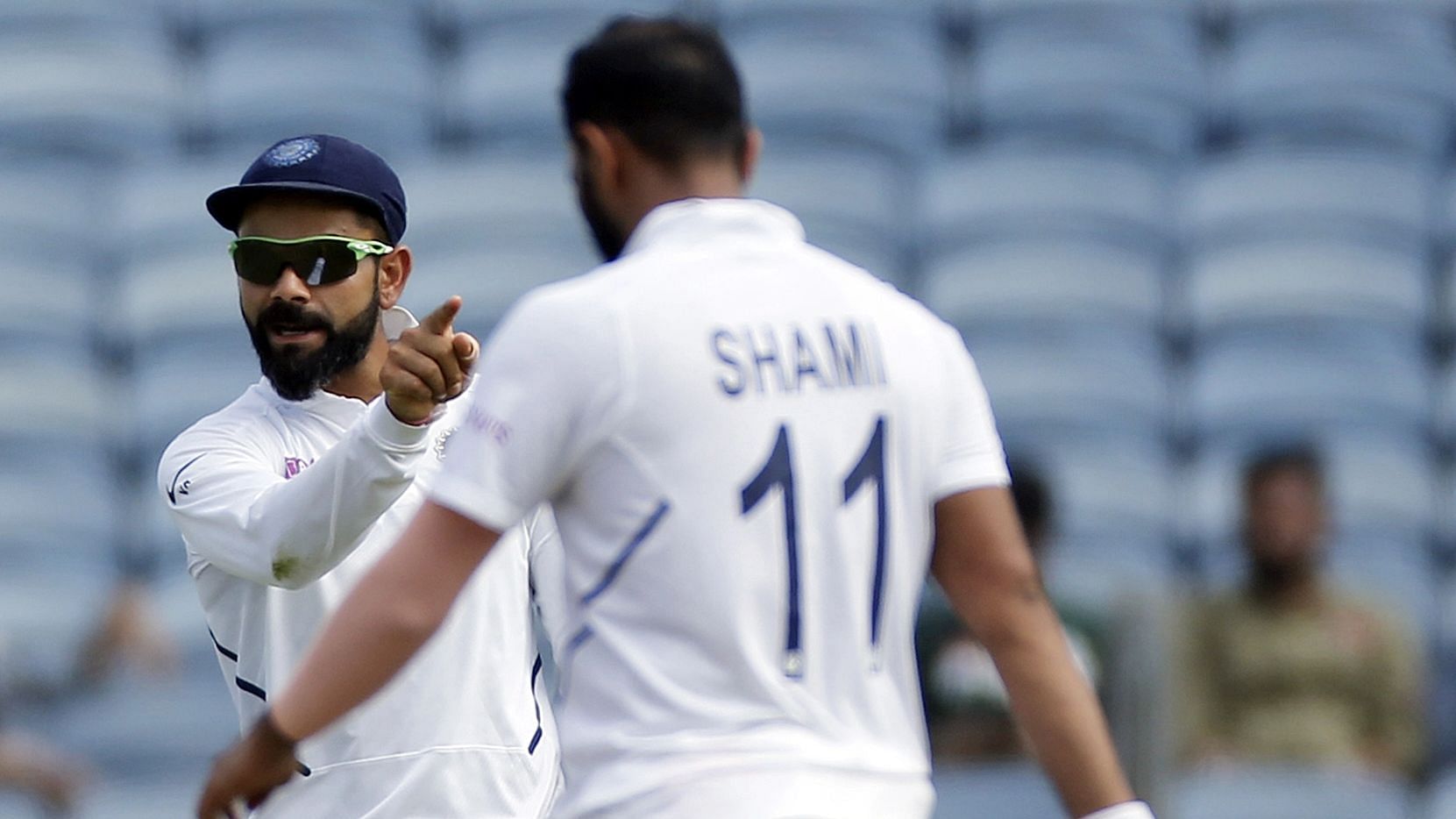 <div class="paragraphs"><p>File: Indian cricket team captain Virat Kohli celebrates a wicket with Mohammed Shami.</p></div>