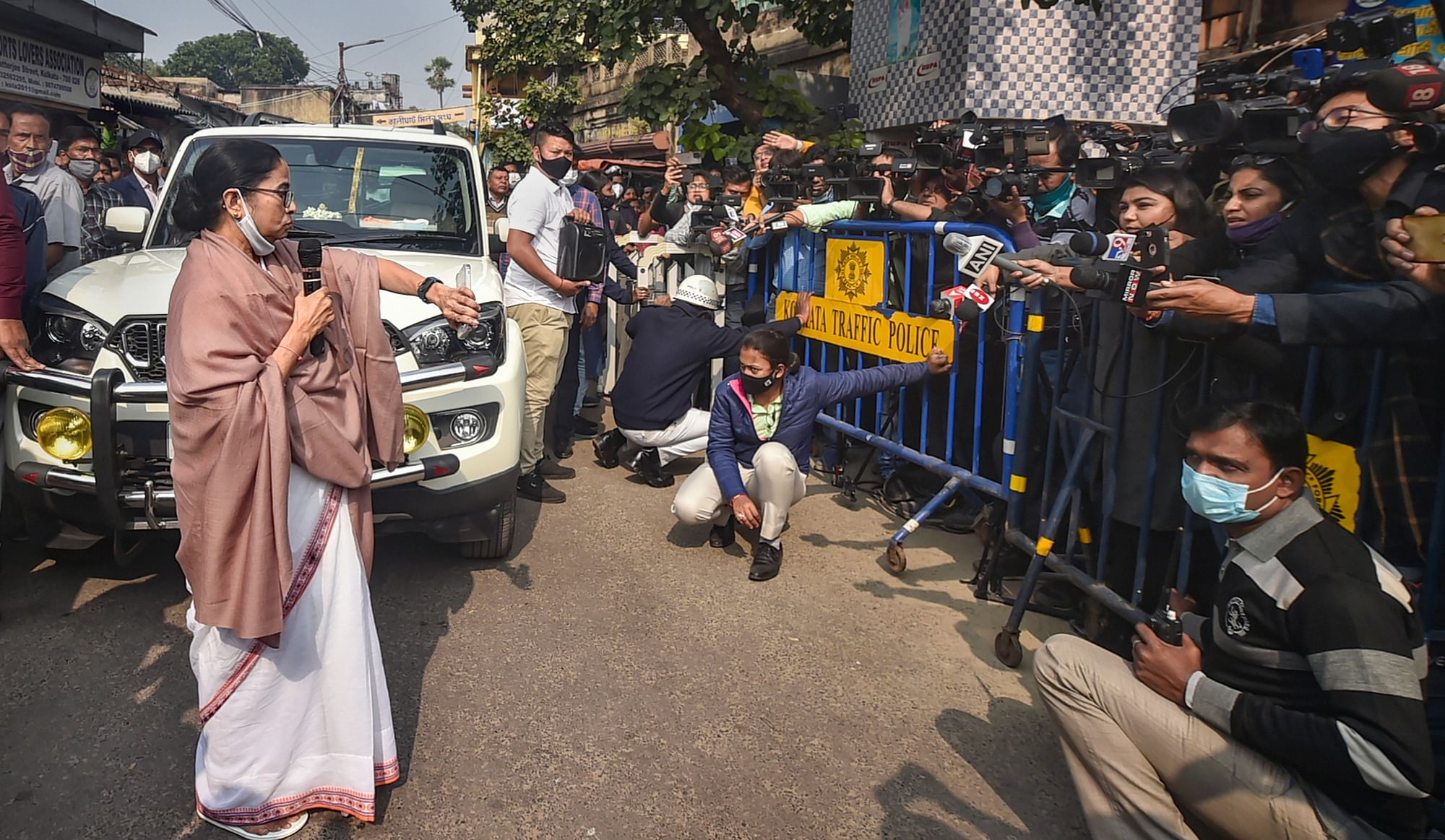 <div class="paragraphs"><p>Kolkata: TMC Supremo and West Bengal Chief Minister Mamata Banerjee check time while interacting with the meadia regarding the Kolkata Municipal Corporation elections, before leaving for Guwahati in Kolkata.</p></div>