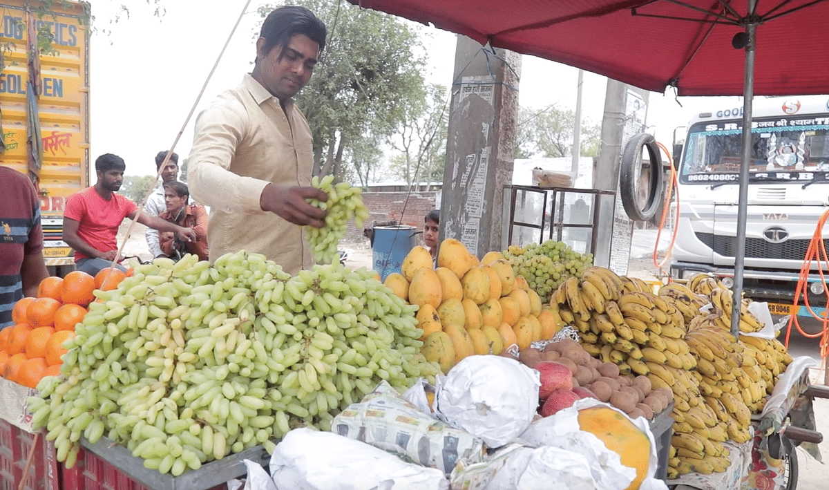 <div class="paragraphs"><p>Juber selling fruits in his village in Haryana.</p></div>