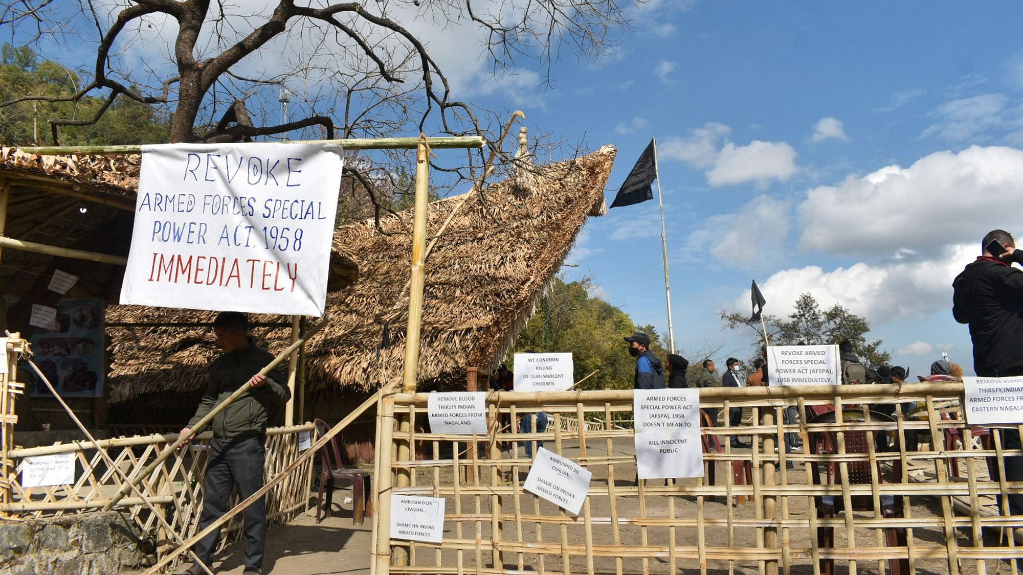 <div class="paragraphs"><p>Kisama: Placards and black flags at the venue of the Hornbill festival in solidarity with the civilians killed in an anti-insurgency operation, in Kisama, Nagaland, Sunday, 5 Dececember.</p></div>