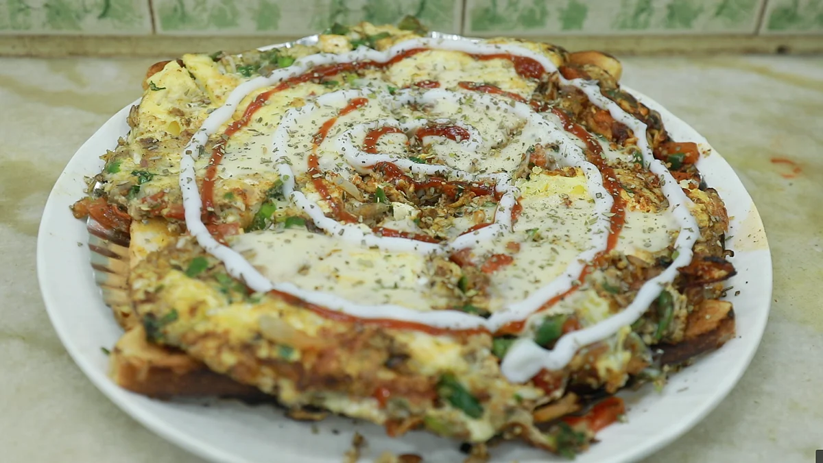 <div class="paragraphs"><p>Omelette pizza.</p></div>