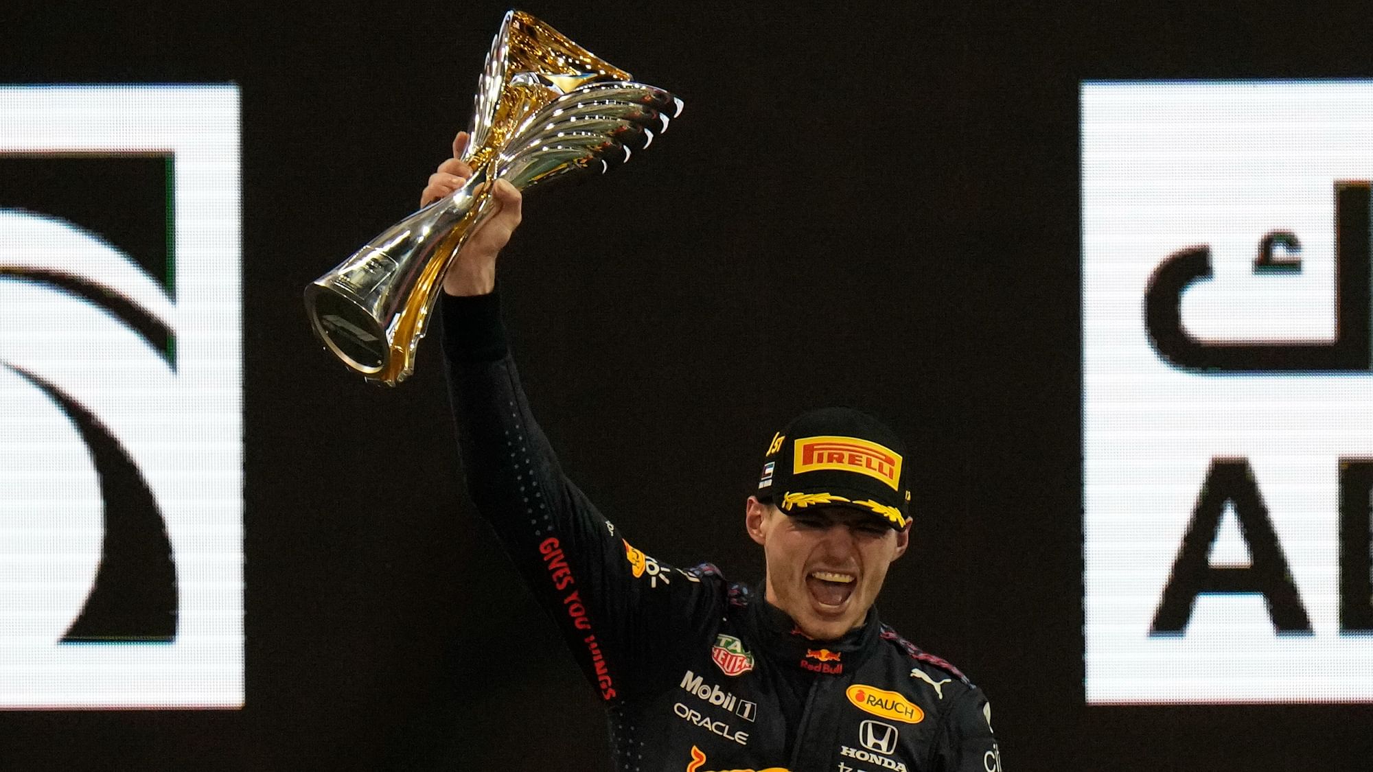 <div class="paragraphs"><p>Max Verstappen celebrates after winning the F1 title.</p></div>