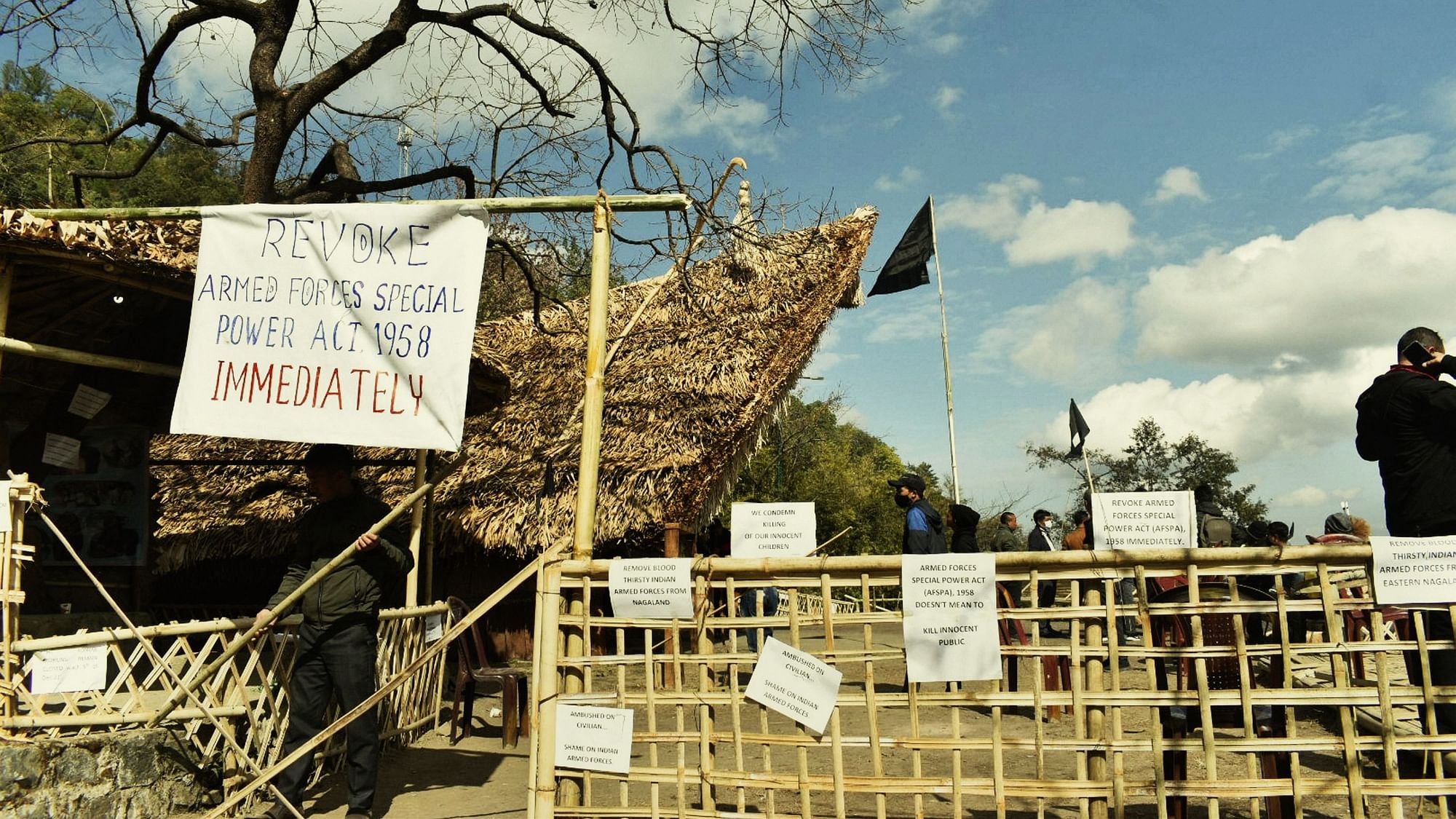 <div class="paragraphs"><p>Placards and black flags at the venue of the Hornbill festival in solidarity with the civilians killed in an anti-insurgency operation, in Kisama, Nagaland.&nbsp;</p></div>
