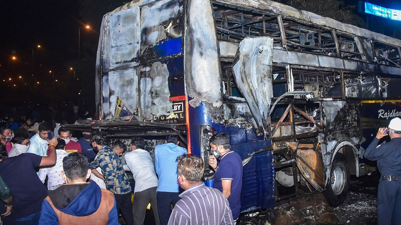 <div class="paragraphs"><p>Charred remains of a bus after a fire broke out at Varachha area in Surat on Tuesday, 18 January 2022</p></div>