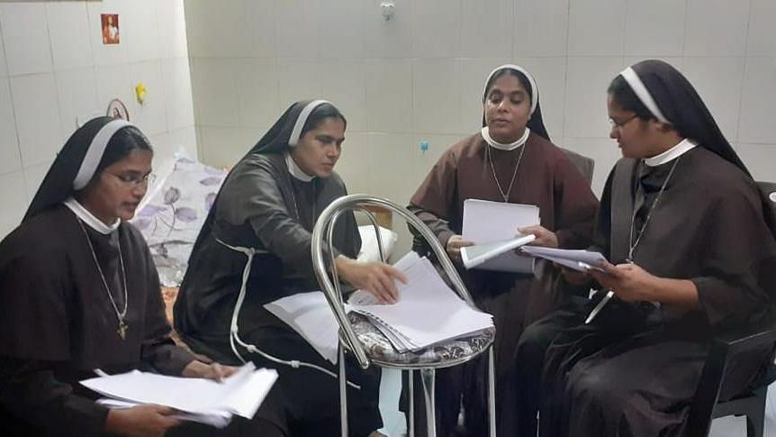 <div class="paragraphs"><p>Sisters of Kuravilangad reading the letters received from people all over the country.</p></div>