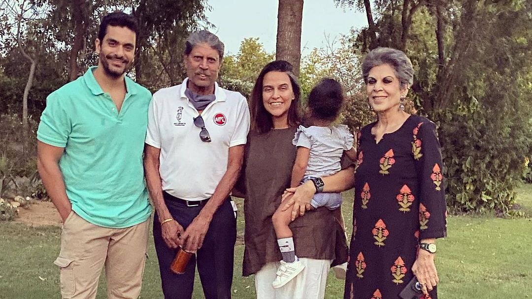 <div class="paragraphs"><p>Neha Dhupia, Angad Bedi and their daughter Mehr with Kapil and Romi Dev.</p></div>