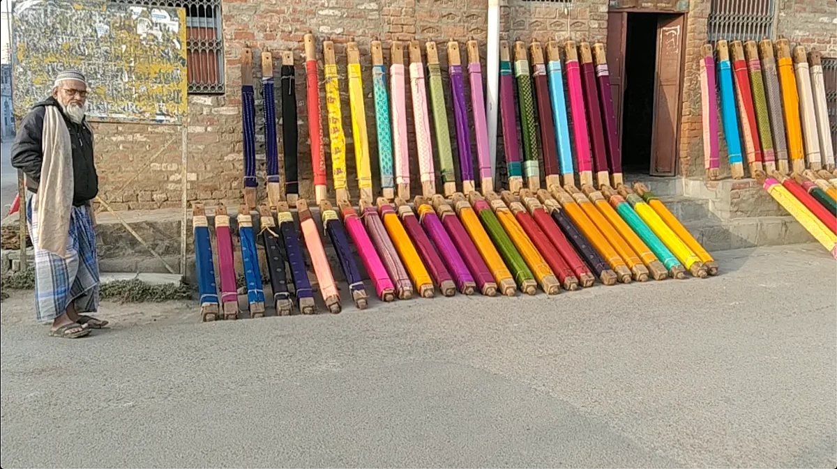 <div class="paragraphs"><p>Rolls of Banarasi Sarees ready to be sold</p></div>