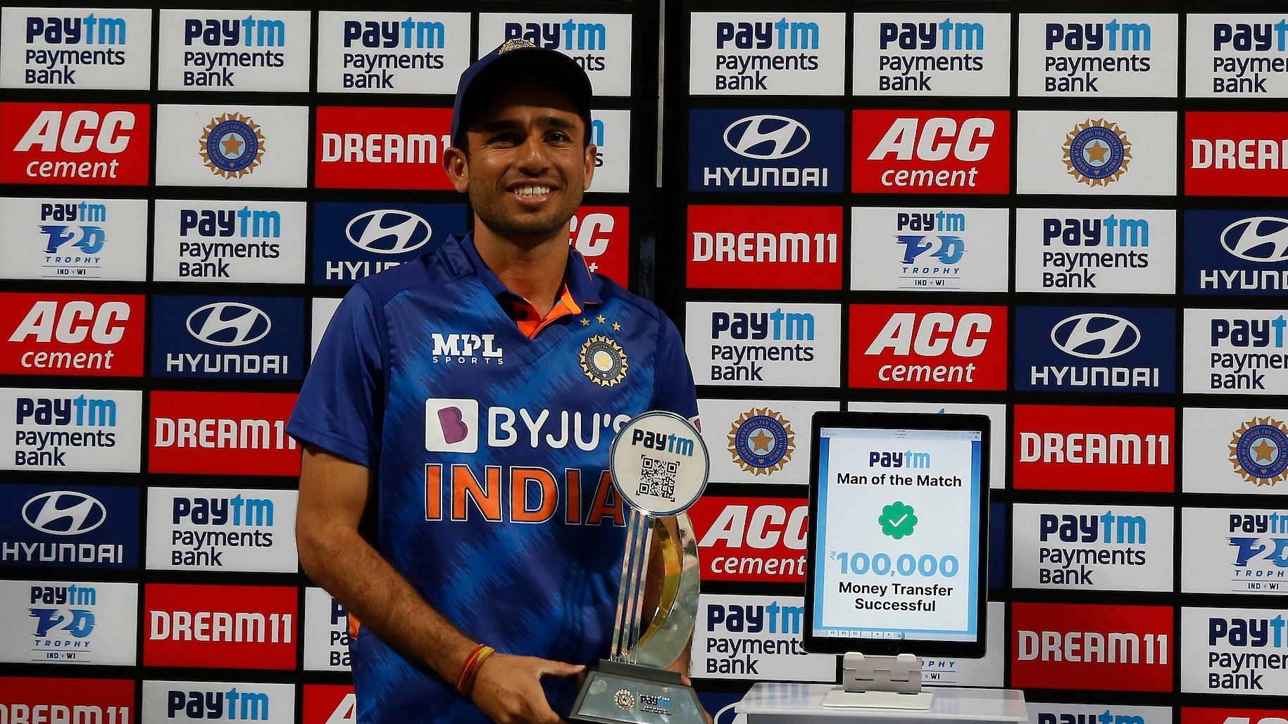 <div class="paragraphs"><p>Ravi Bishnoi of India receives the Paytm Man of The Match Award after the first T20I vs West Indies.</p></div>