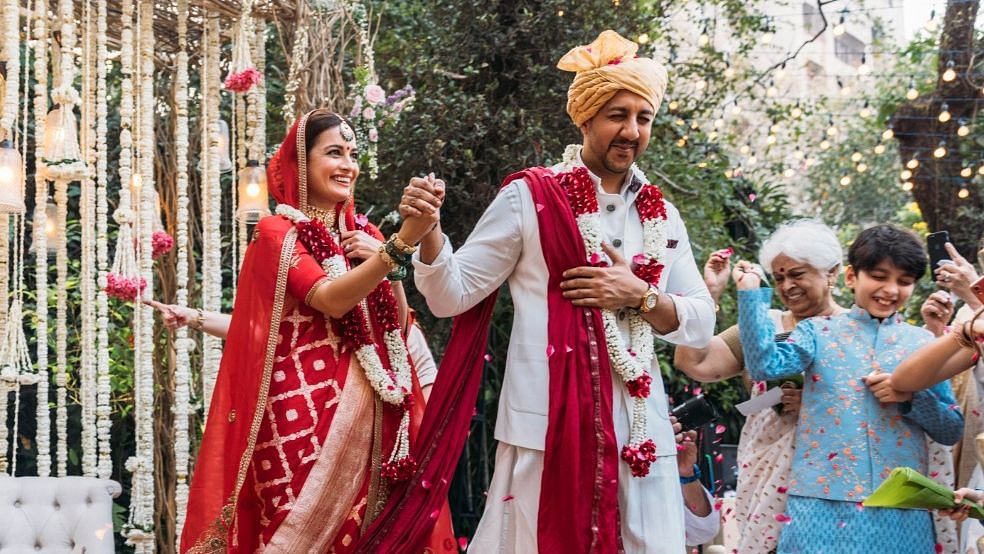 <div class="paragraphs"><p>Dia Mirza and Vaibhav Rekhi at their wedding.</p></div>