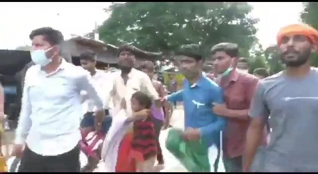 Afsar Ahmad was beaten and paraded by Bajrang Dal members, as his daughter clung to him, begging the mob to let go.