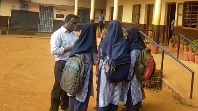 <div class="paragraphs"><p>Several students across Karnataka on Tuesday, February 15 chose to return home without attending school after they were denied permission to wear hijabs inside the school premises by the authorities.</p></div>