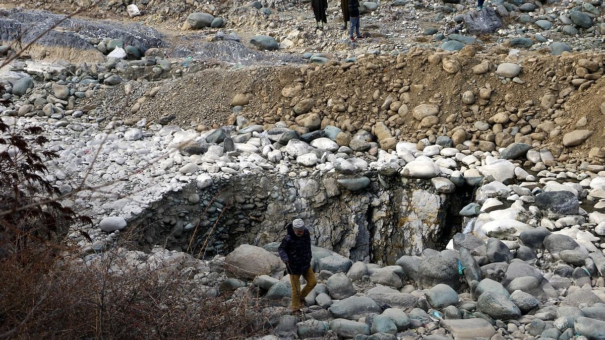 In Photos: Sinkhole Drains Freshwater Stream in J&K; Trout Population Dwindles