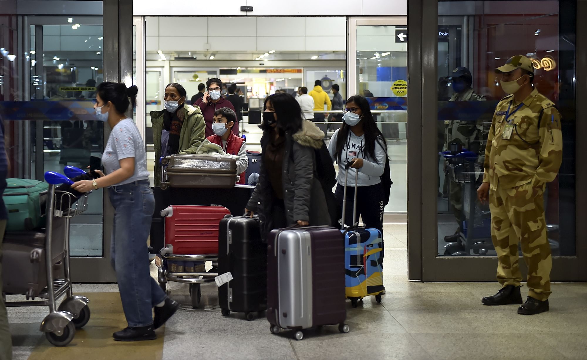 <div class="paragraphs"><p>Indian nationals come  out from the IGI Airport on their arrival  by an Air India flight from Ukraine amid rising Russia-Ukraine tension, in New Delhi, on 23 February.</p></div>