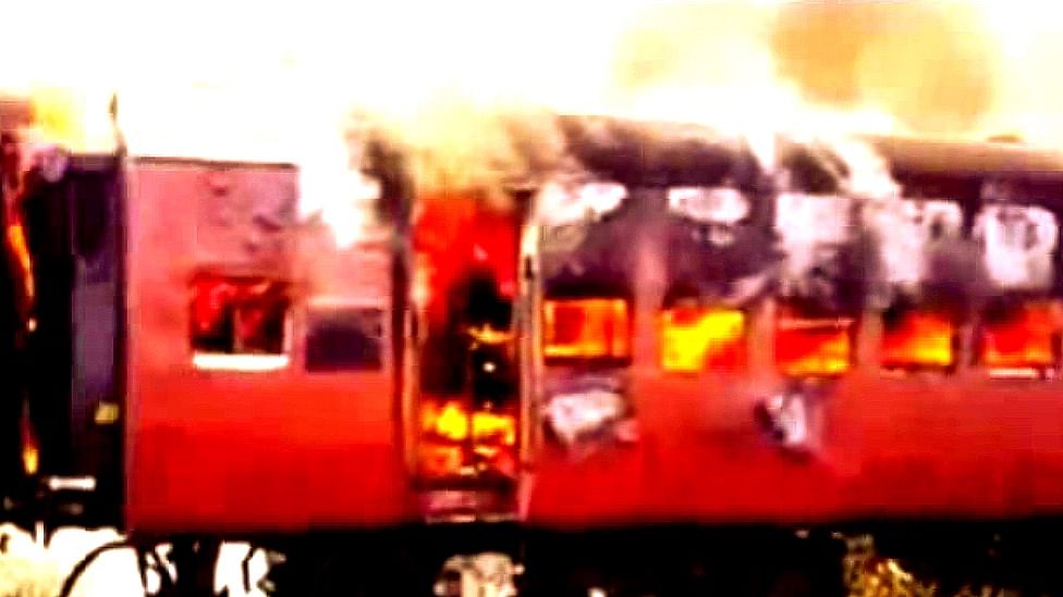 <div class="paragraphs"><p>The Sabarmati Express on fire. </p></div>