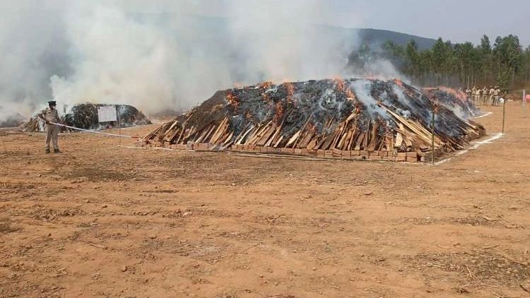<div class="paragraphs"><p>Erecting huge pyres in the ground in Kodur, which is in Anakapalle mandal of Visakhapatnam, the Andhra Pradesh Police carried out the exercise.</p></div>