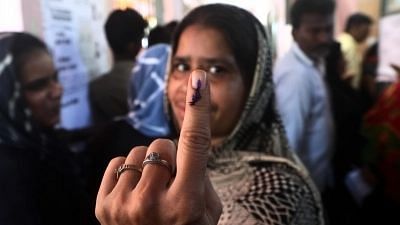 <div class="paragraphs"><p>A voter shows her inked finger after casting her vote. Photo used for representational purposes.</p></div>