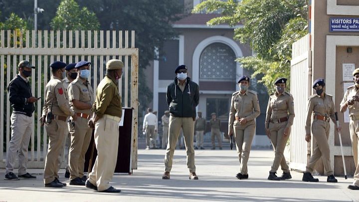 <div class="paragraphs"><p>Police stand guard outside a Sessions Court on the day of the verdict in the 2008 Ahmedabad serial bomb blasts case.</p></div>