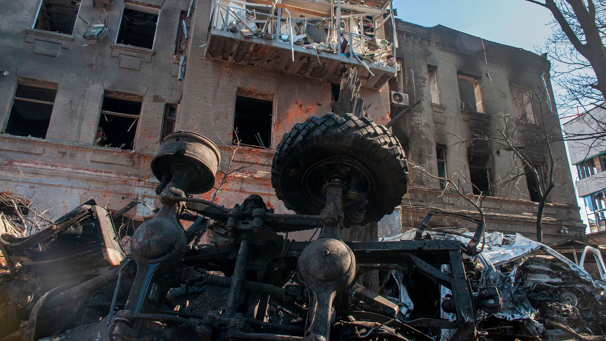 <div class="paragraphs"><p>A destroyed car is seen in front of a damaged building in Kharkiv, Ukraine.</p></div>