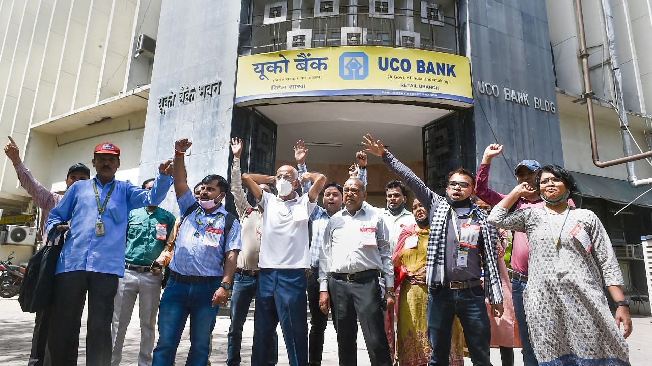 <div class="paragraphs"><p>Employees of the UCO Bank raise slogans in protest during Bharat Bandh, a two-day nationwide strike supported by the All India Bank Employees Association over the government's plan to privatise public sector banks and the Banking Laws Amendment Bill 2021.</p></div>