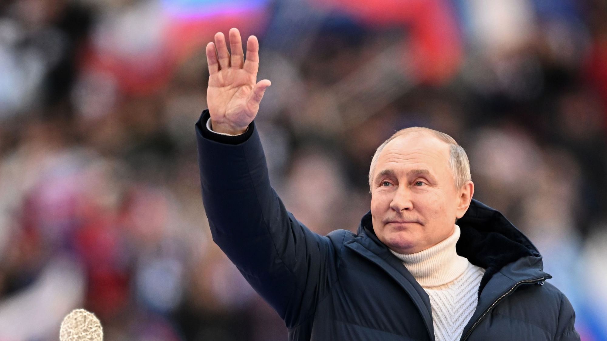 <div class="paragraphs"><p>Russian President Vladimir Putin greets people gathered to attend the concert marking the eighth anniversary of the referendum on the state status of Crimea and Sevastopol and its reunification with Russia, in Moscow, Russia, Friday, 18 March.</p></div>