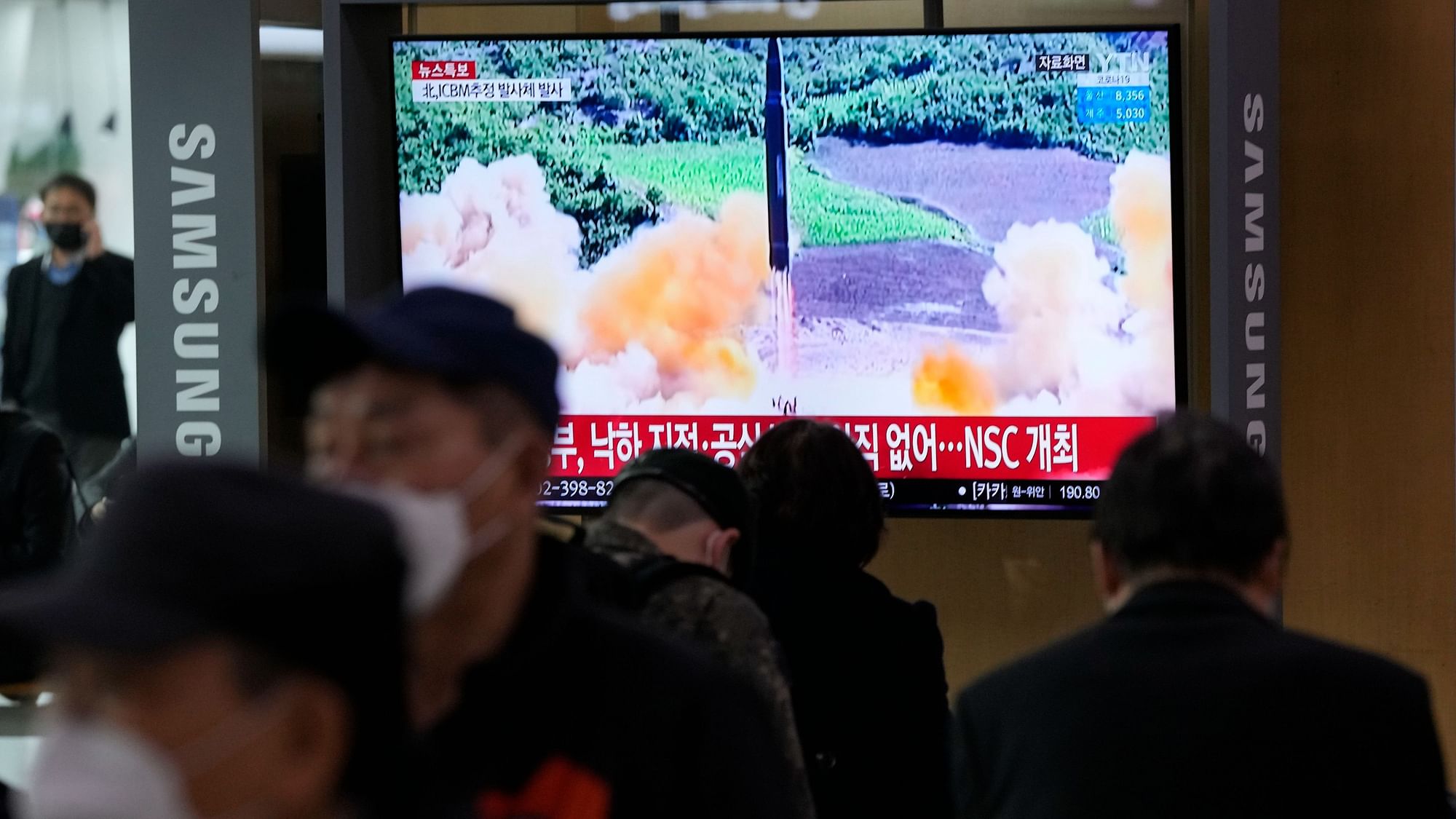 <div class="paragraphs"><p>People watch a TV showing a file image of North Korea's missile launch during a news program at the Seoul Railway Station in Seoul, South Korea, Thursday, 24 March, 2022. </p></div>