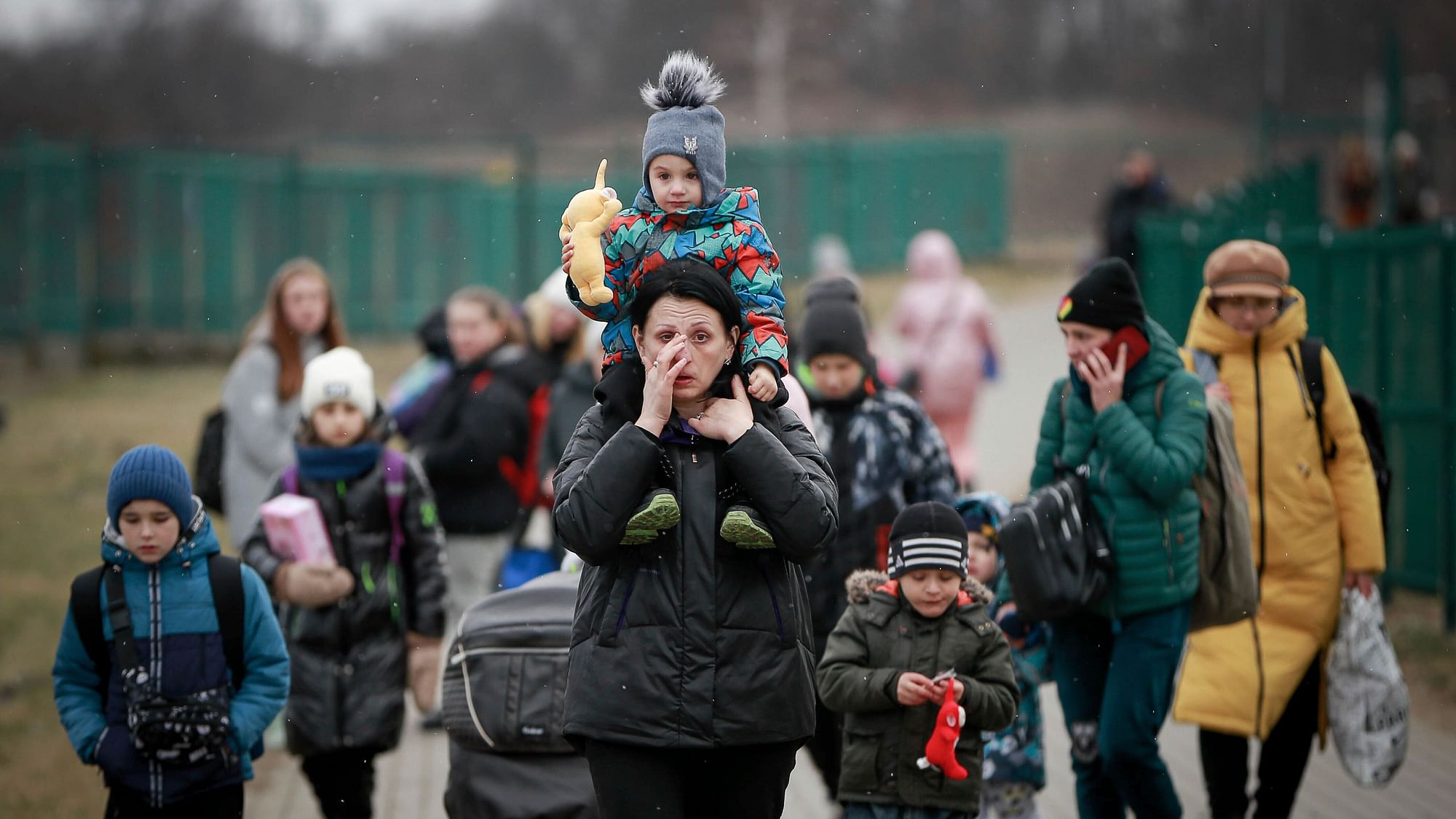 <div class="paragraphs"><p>Refugees, mostly women with children, arrive at the border crossing in Medyka, Poland, Saturday, 5 March 2022, after fleeing Russian invasion in Ukraine. Representational Image.</p></div>
