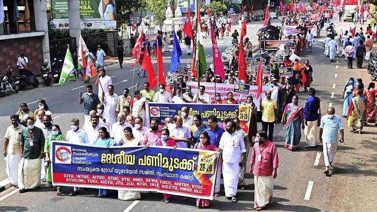 <div class="paragraphs"><p>Workers participating in the two-day nationwide strike in Kerala on Monday, 28 March.</p></div>