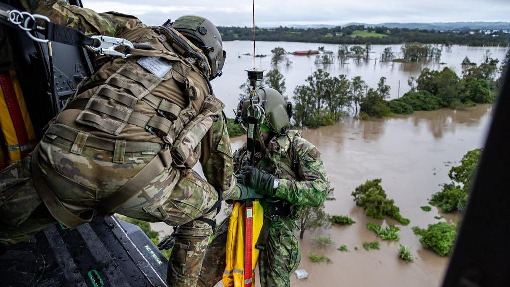 <div class="paragraphs"><p>Torrential rains resulting in massive flooding have claimed at least 14 lives in Australia in the past few days, with nine deaths being reported from Queensland</p></div>