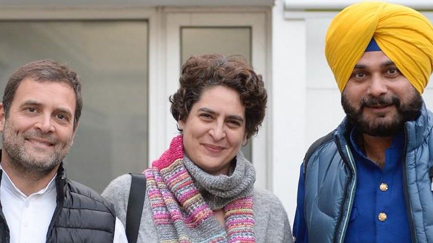 <div class="paragraphs"><p>File pic of Navjot Singh Sidhu with Rahul Gandhi and Priyanka Gandhi Vadra.</p></div>