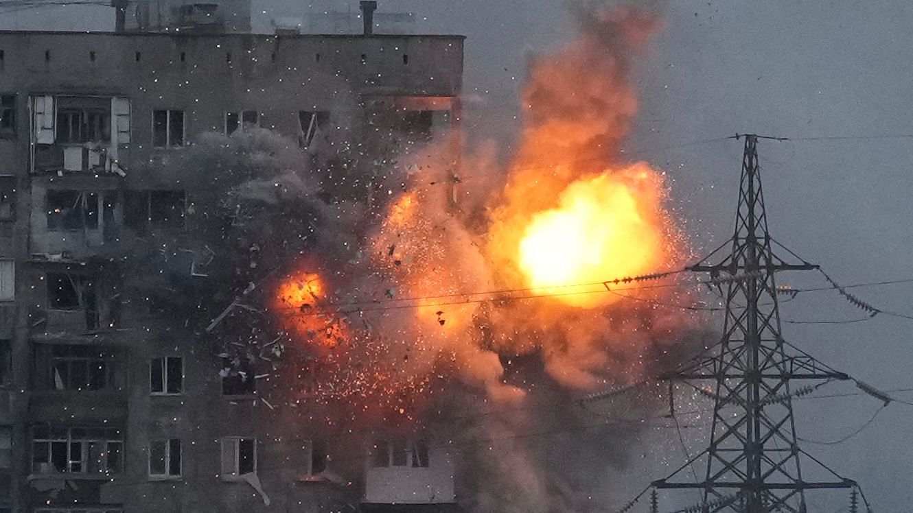 <div class="paragraphs"><p>An explosion in an apartment building that came under fire from a Russian army tank in Mariupol, Ukraine.</p></div>
