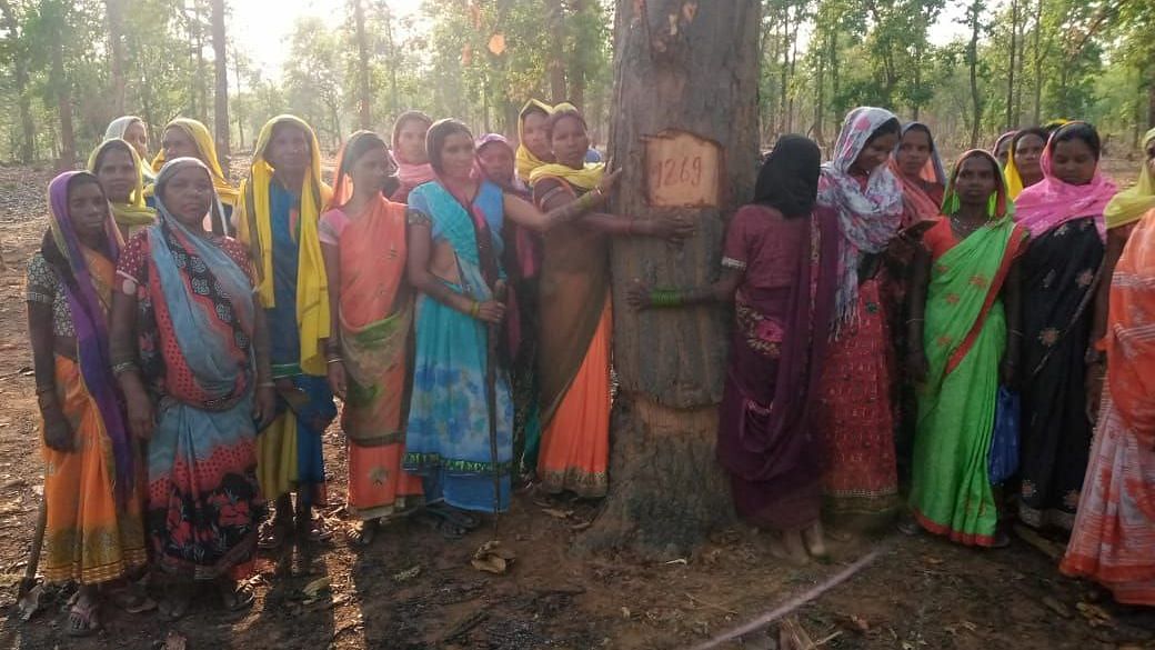 <div class="paragraphs"><p>Women of Hasdeo, Chhattisgarh hug the trees as they are being marked to be axed by the authorities post final approval for the Parsa coal mine by Bhupesh Baghel government.&nbsp;</p></div>
