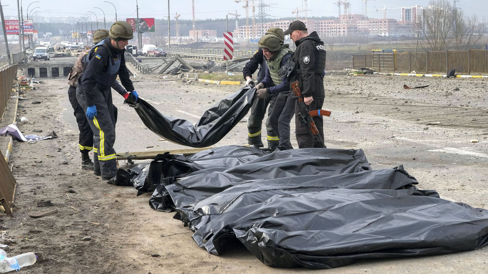 <div class="paragraphs"><p>Image used for representation only. Ukrainian soldiers collect bodies of civilians killed by the Russian forces at the destroyed bridge in Irpin close to Kyiv, Ukraine.</p></div>