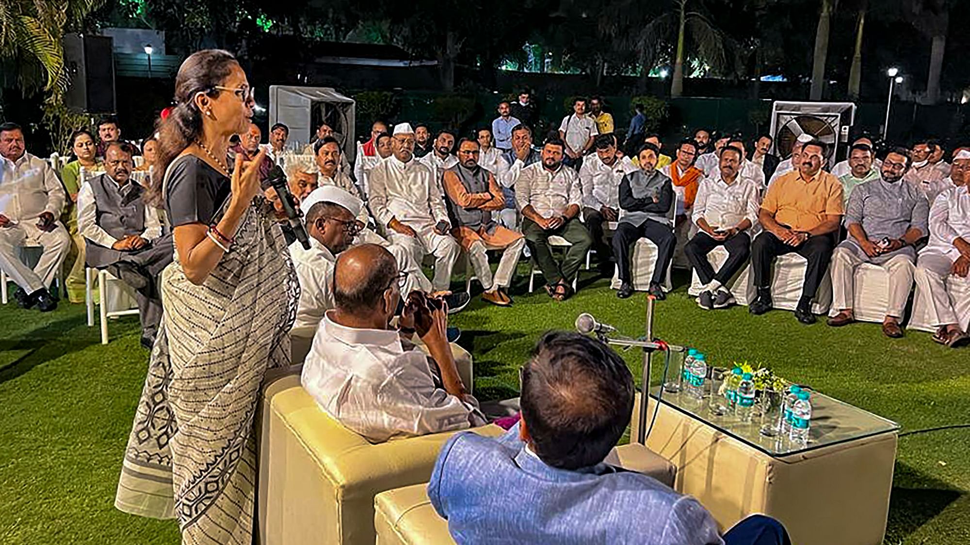 <div class="paragraphs"><p>NCP MP Supriya Sule speaks during the dinner for Maharashtra MLAs at NCP President Sharad Pawar's residence, in New Delhi</p></div>