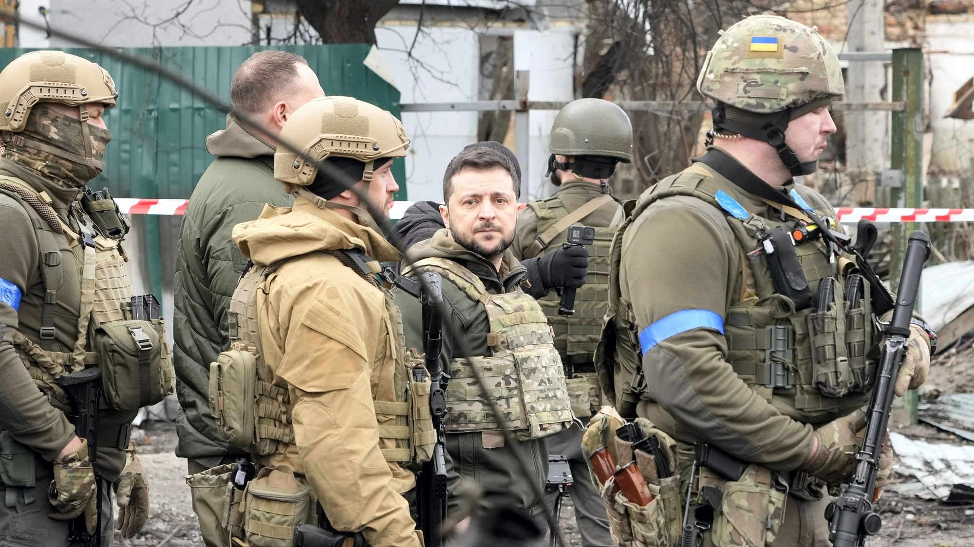 <div class="paragraphs"><p>Ukrainian President Volodymyr Zelenskyy examines the site of a recent battle in Bucha, close to Kyiv, Ukraine, Monday, 4 April, 2022.</p></div>