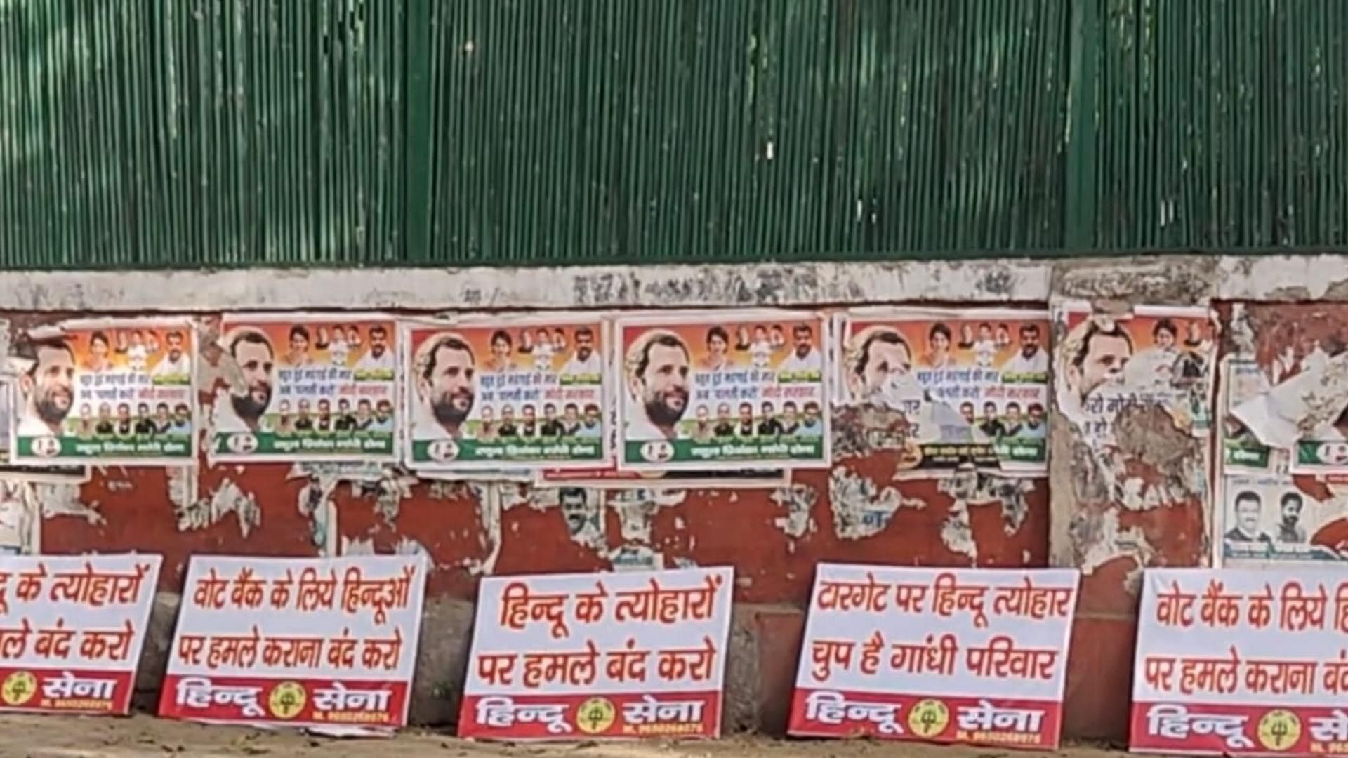 <div class="paragraphs"><p>Hindu Sena members put up posters outside Congress headquarters.&nbsp;</p></div>