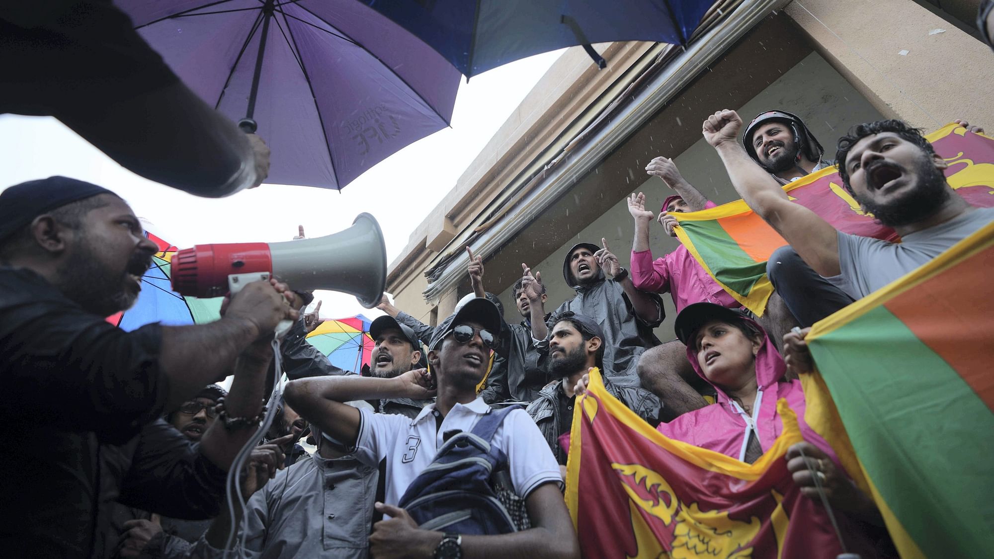 <div class="paragraphs"><p>Sri Lankans protest demanding president Gotabaya Rajapaksa and his government resign near presidential secretariat in Colombo, Sri Lanka.</p></div>