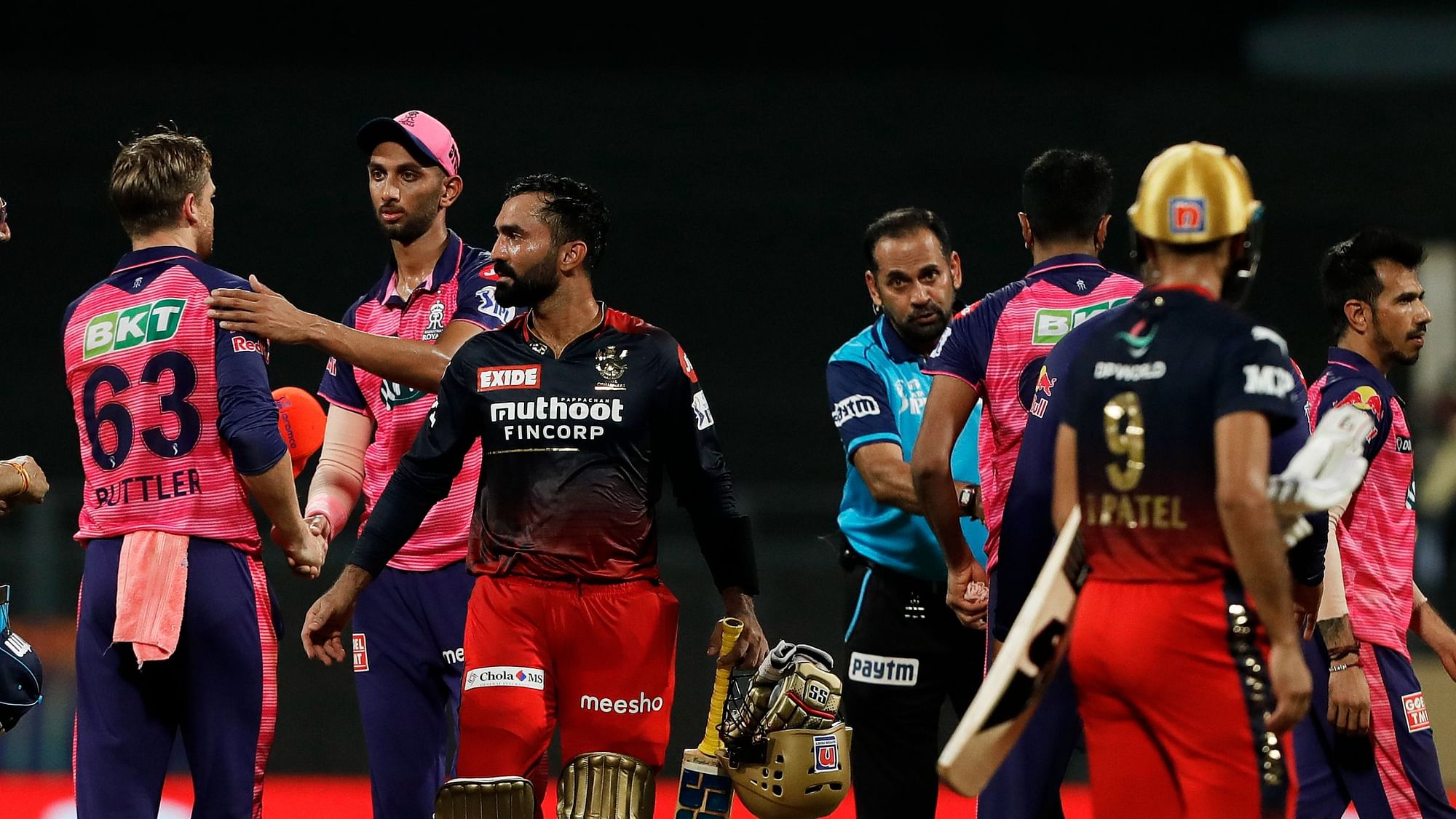 <div class="paragraphs"><p>Rajasthan Royals and Royal Challengers Bangalore shake hands after Match 13 of IPL 2022.</p></div>