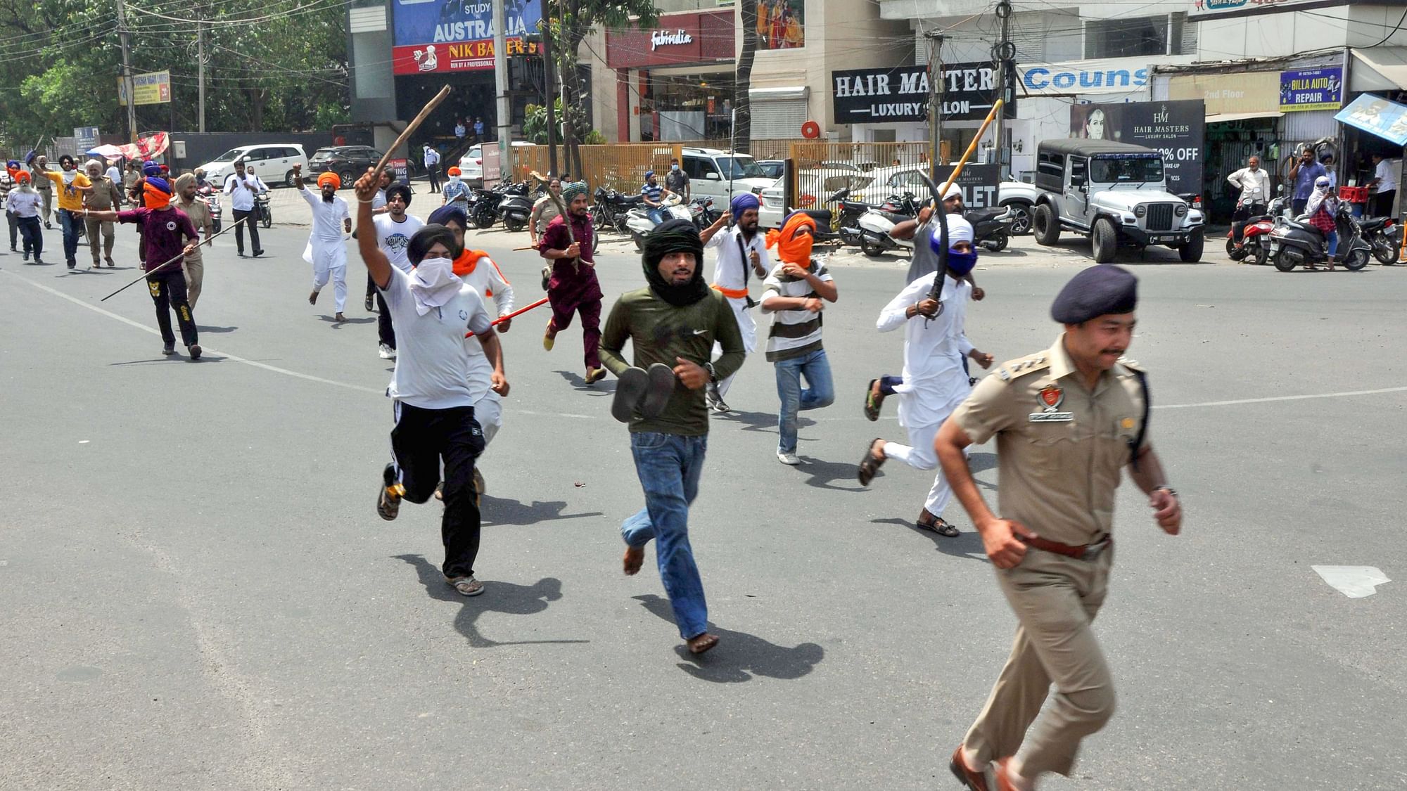 <div class="paragraphs"><p>A clash broke out between two groups in Punjab's Patiala during a protest against the Khalistan movement on Friday, 29 April, following which the police fired shots into the air to disperse the crowd.</p></div>