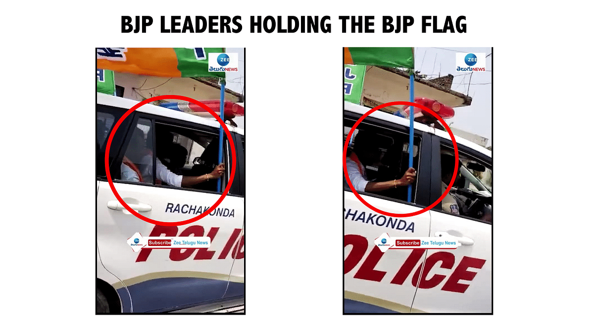 The BJP flag was waved by the party workers sitting inside the police vehicle who had been detained during a protest